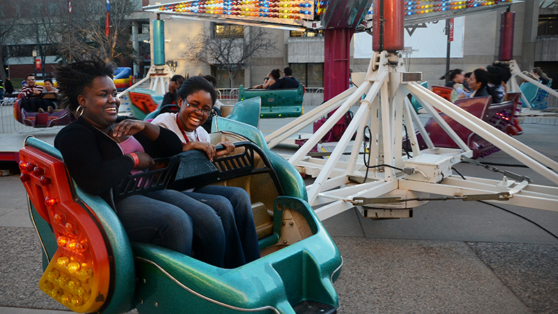 Two students on carnival ride