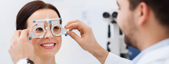 a woman receiving an optical exam