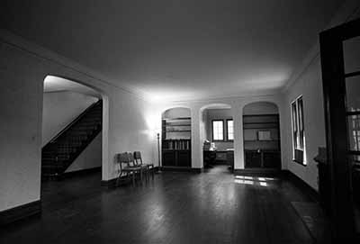 Lewis House first floor living room, foyer, and steps, 1973