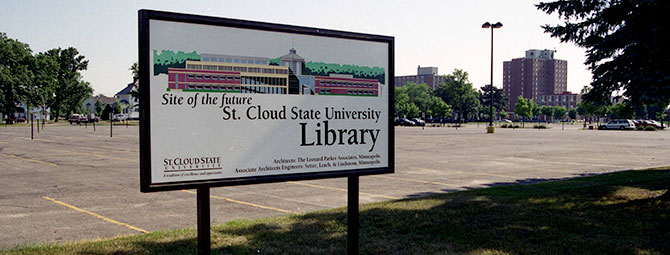 a sign showing the future site of the SCSU library before it was built