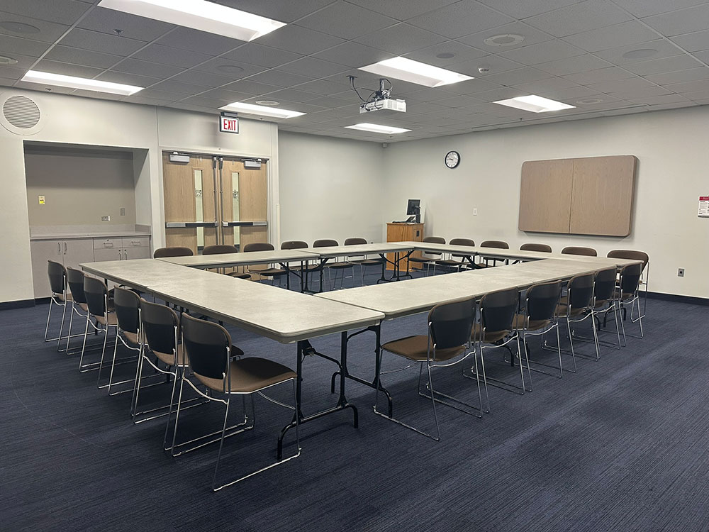 an interior view of the Glacier South Room in Atwood Memorial Center showing multiple tables combined together