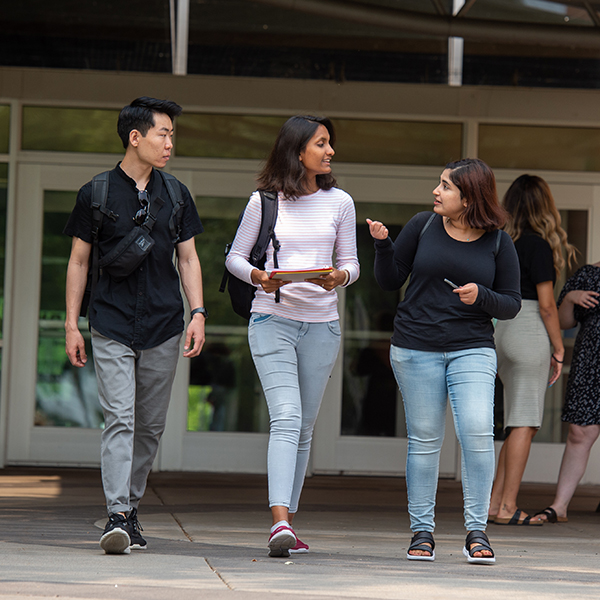 Students walking out of library