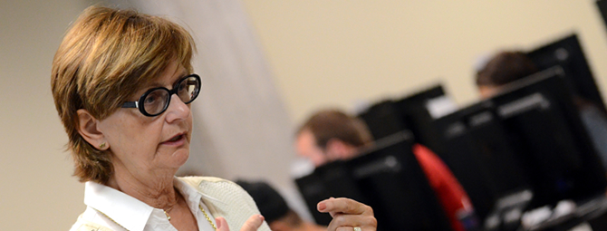 Accounting professor Kathleen Mooney in a Centennial Hall classroom