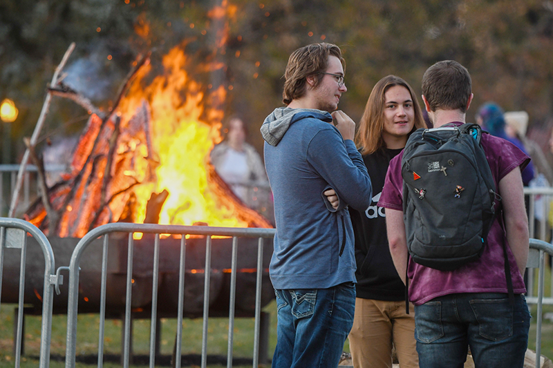 Students attend the Homecoming bonfire