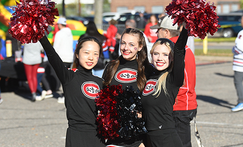 SCSU cheerleaders pose for a photo