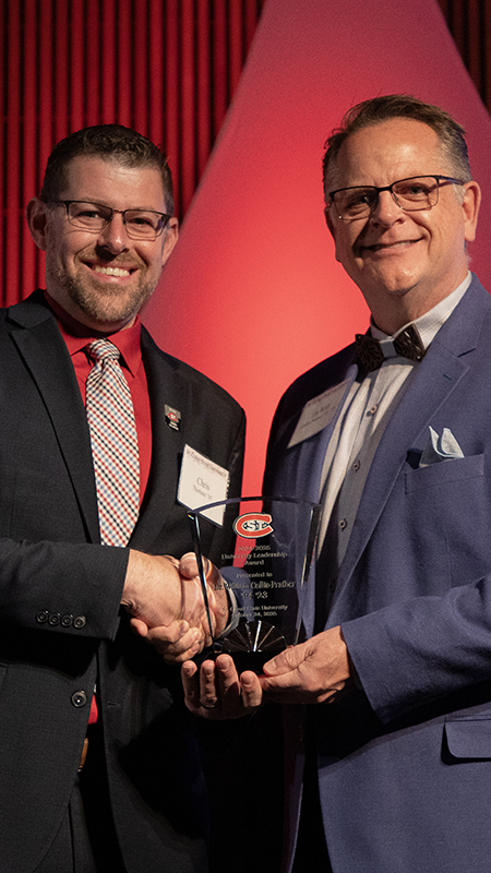 Dr. Will Collis-Prather receives his alumni award