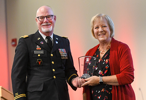 Maj. John Donovan receives his award at a past SCSU Alumni Association Awards ceremony