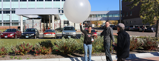 Students using weather balloon