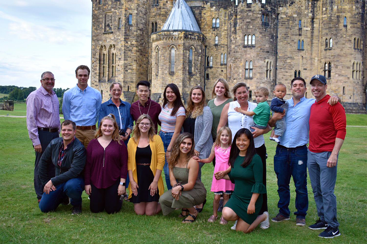 Class photo in front of castle