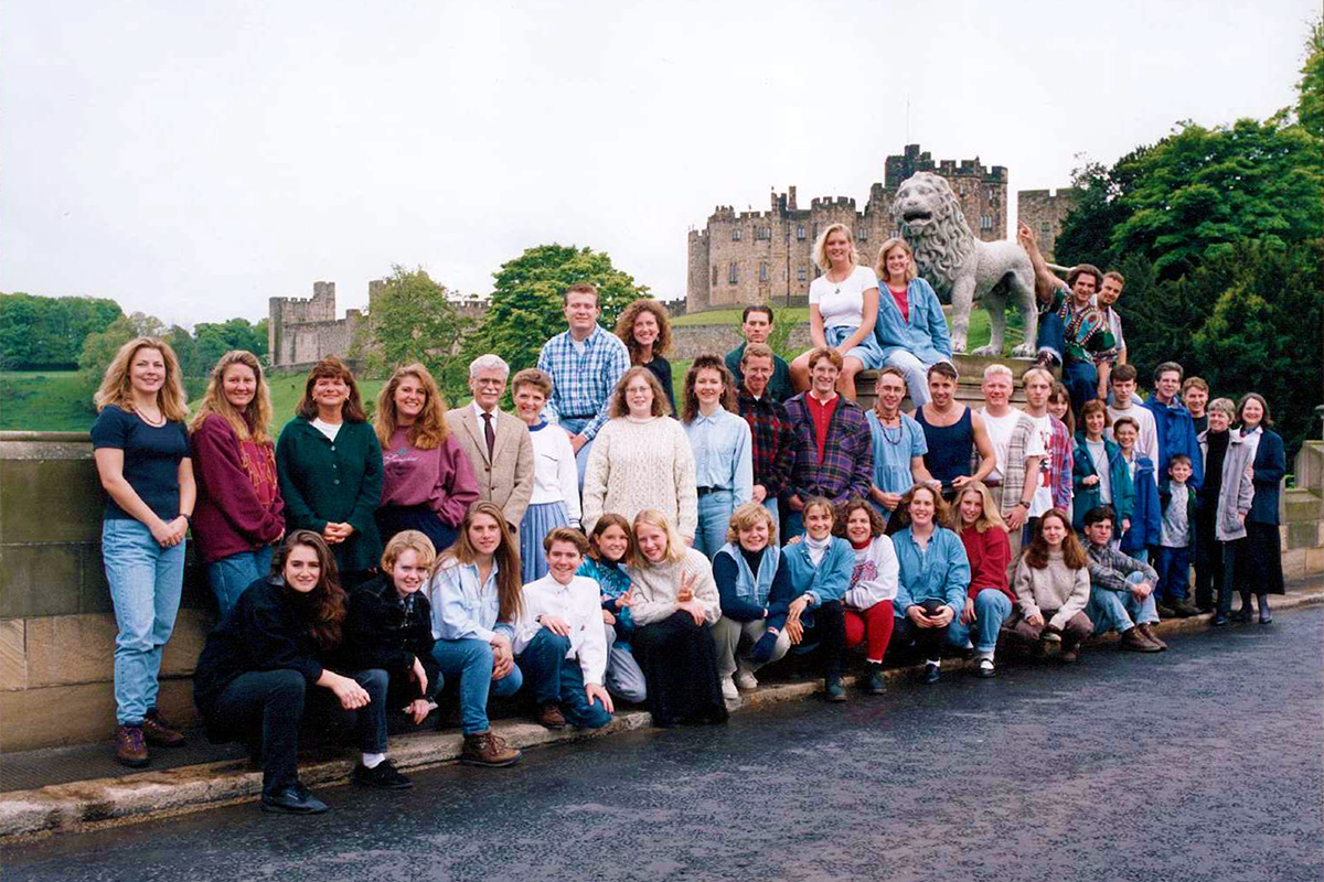 Class photo in front of castle
