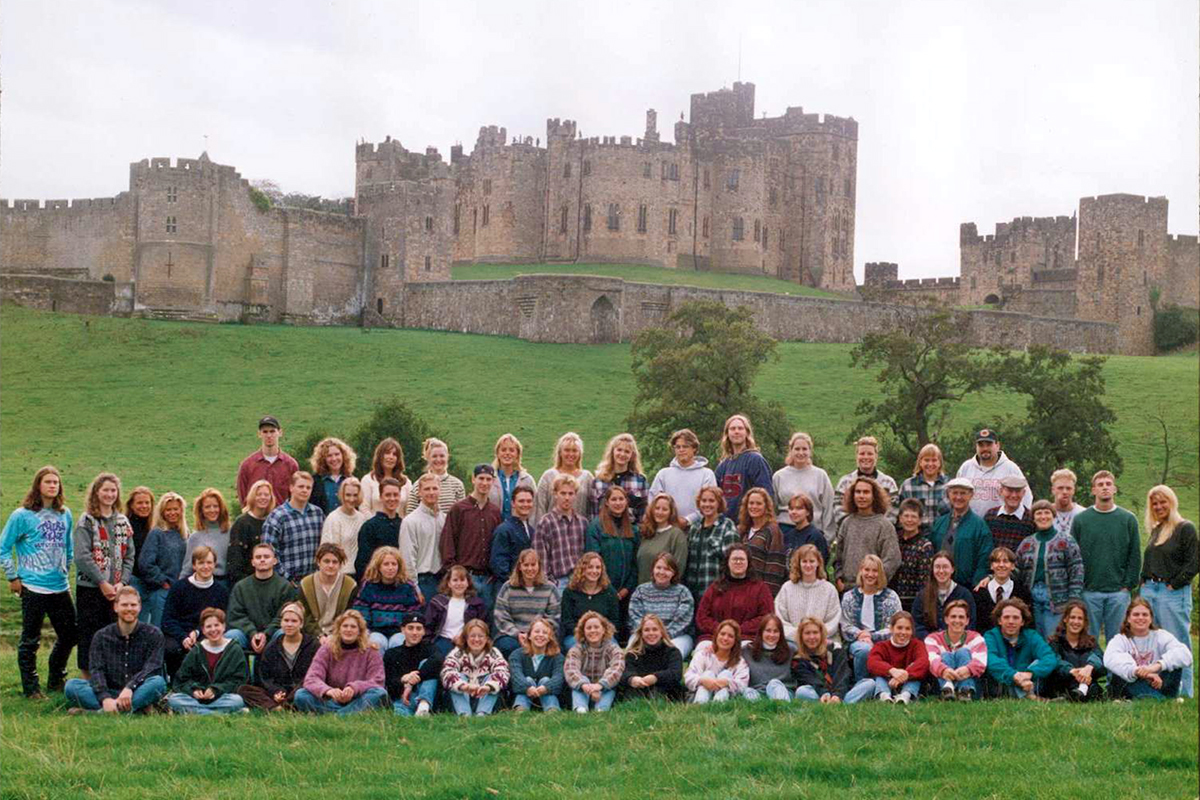 Class photo in front of castle