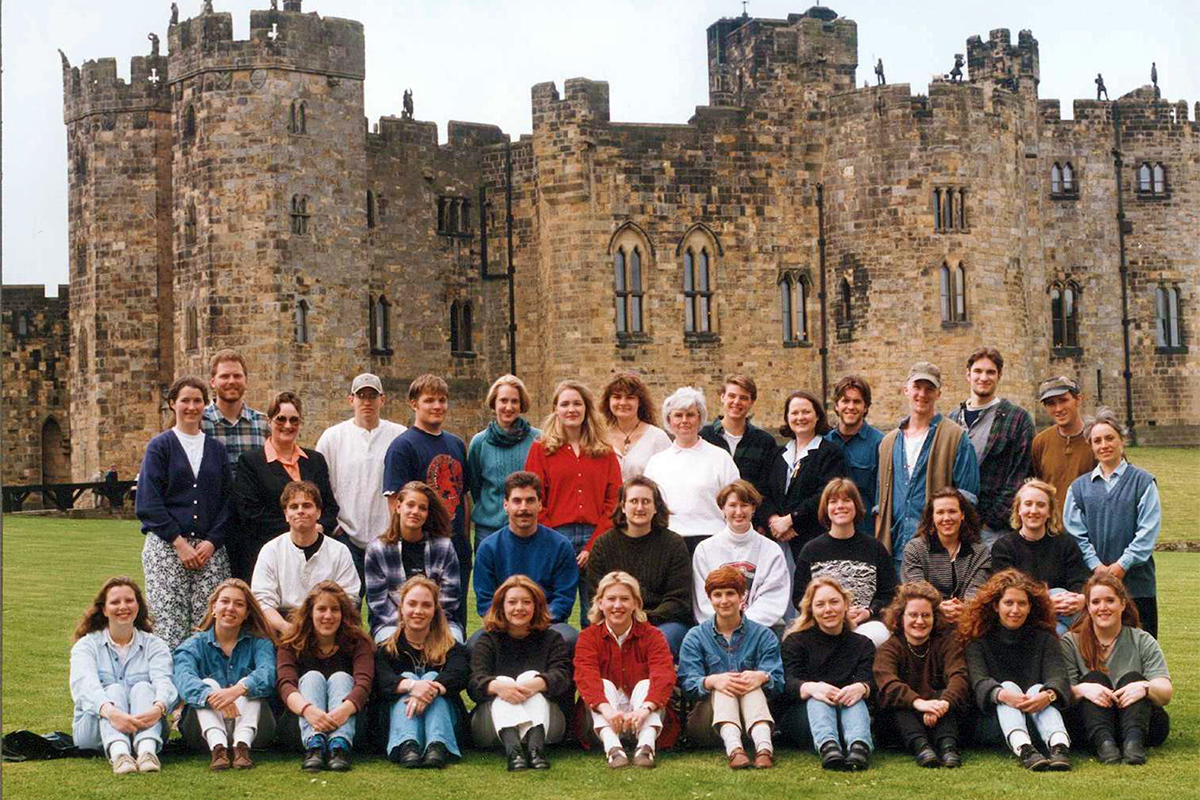 Class photo in front of castle
