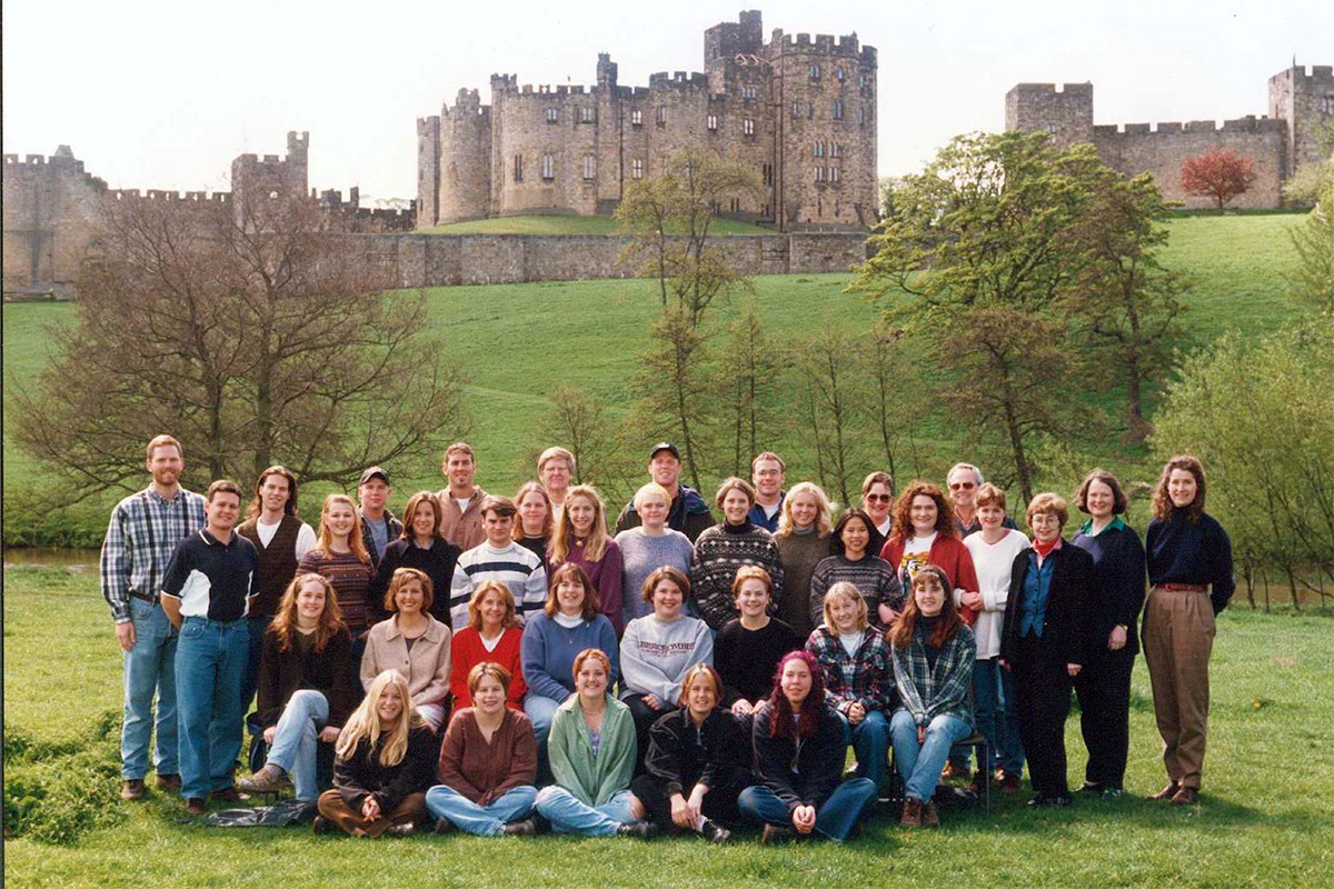 Class photo in front of castle