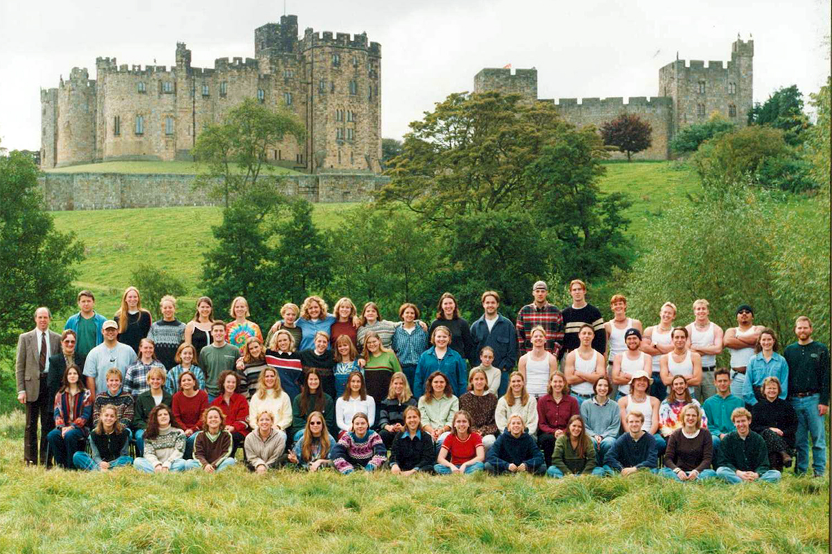 Class photo in front of castle