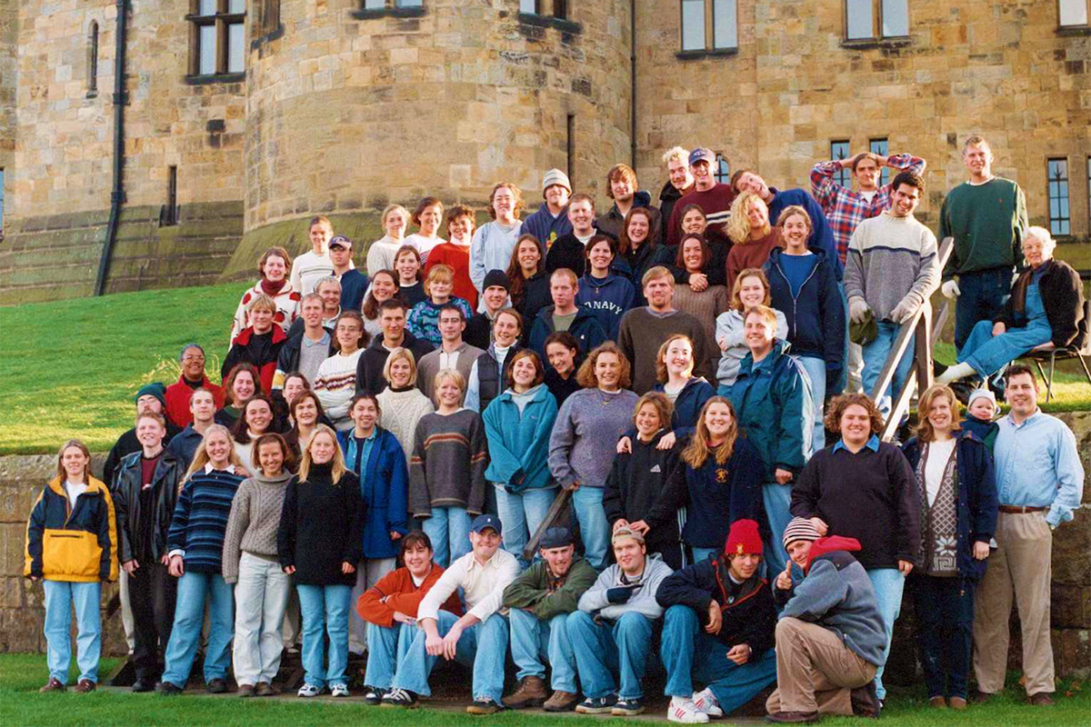 Class photo in front of castle