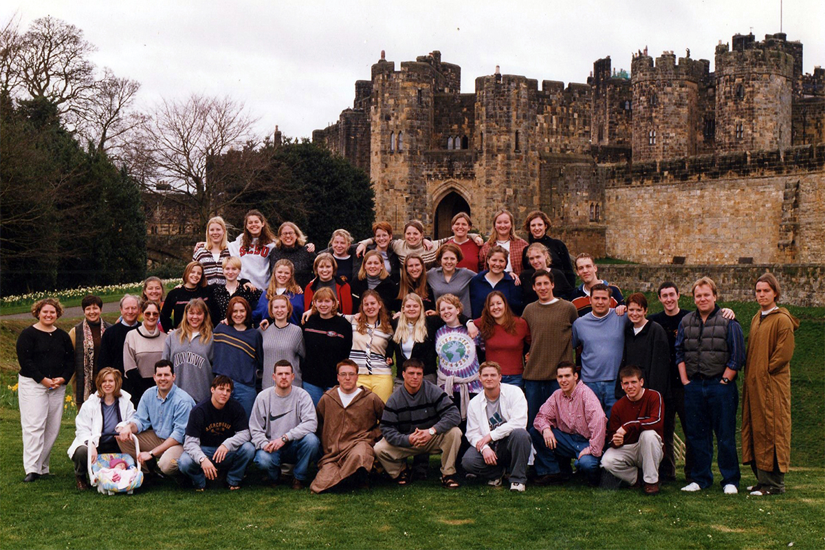 Class photo in front of castle