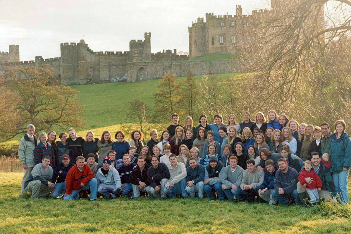 Class photo in front of castle