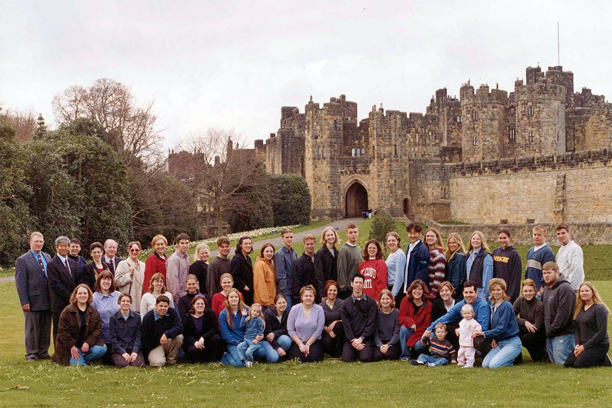 Class photo in front of castle