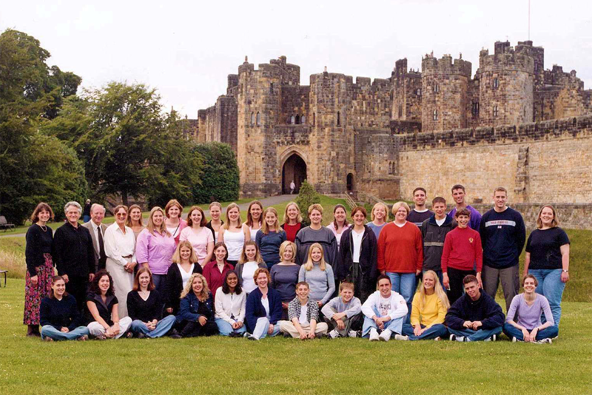 Class photo in front of castle