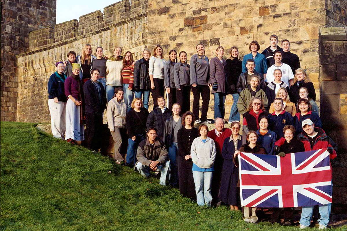Class photo in front of castle