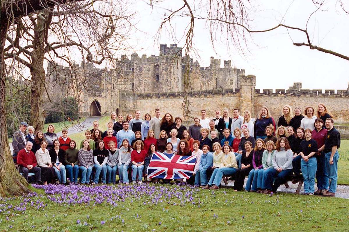 Class photo in front of castle