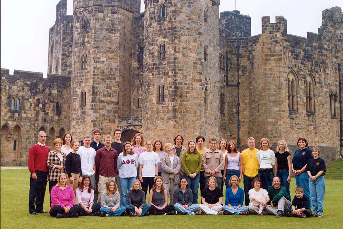 Class photo in front of castle