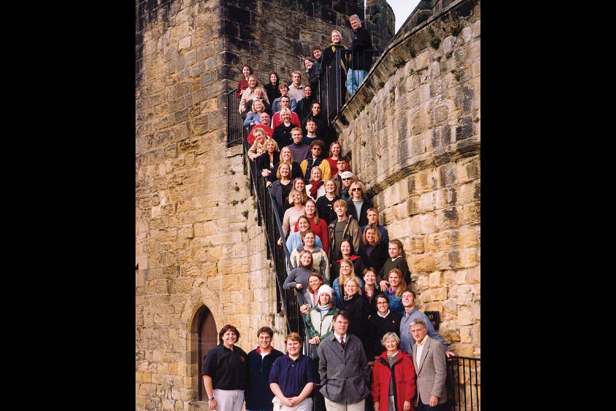 Class photo in front of castle