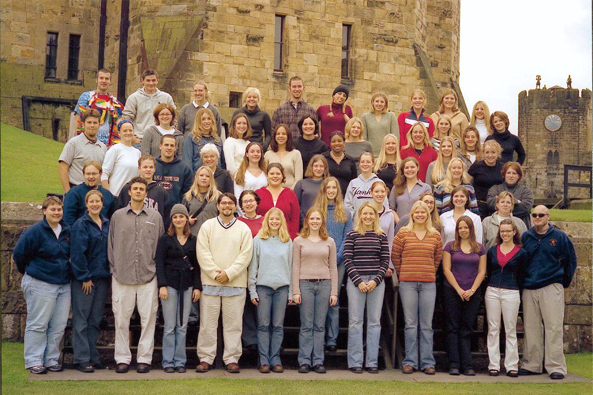Class photo in front of castle