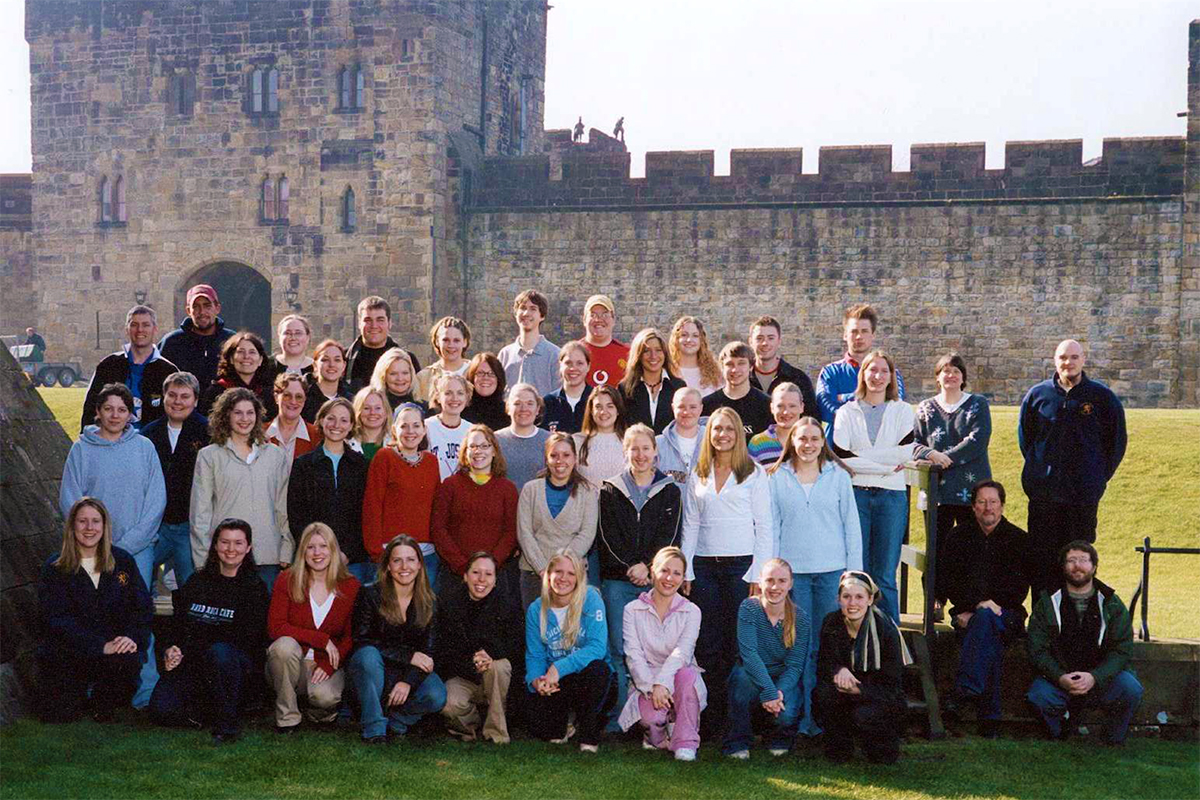 Class photo in front of castle