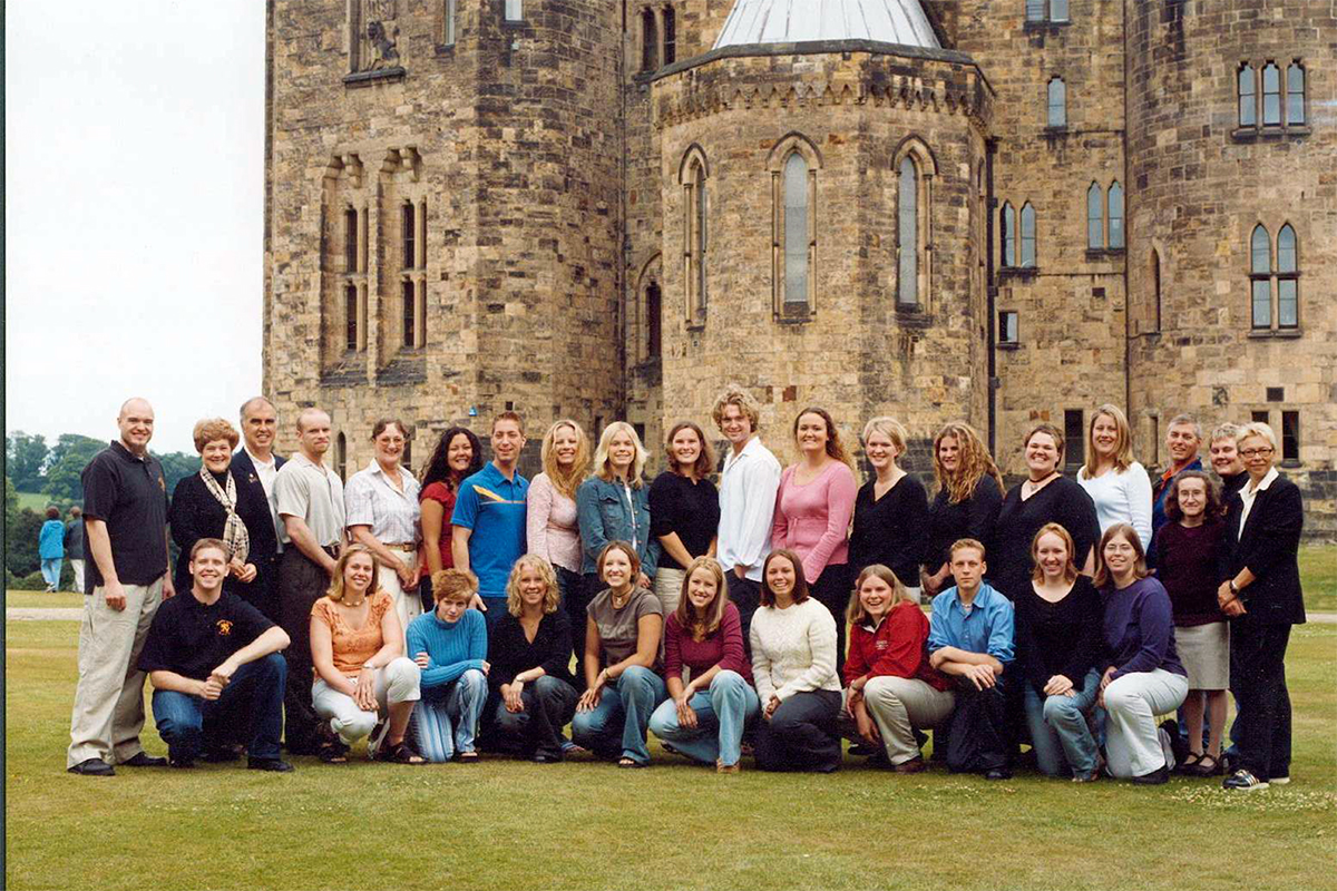 Class photo in front of castle
