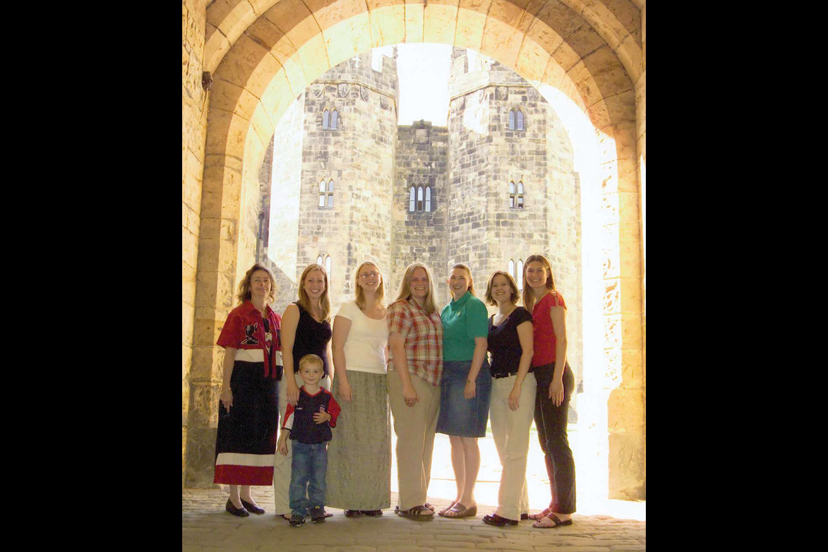 Class photo in front of castle
