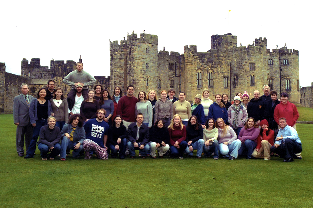 Class photo in front of castle