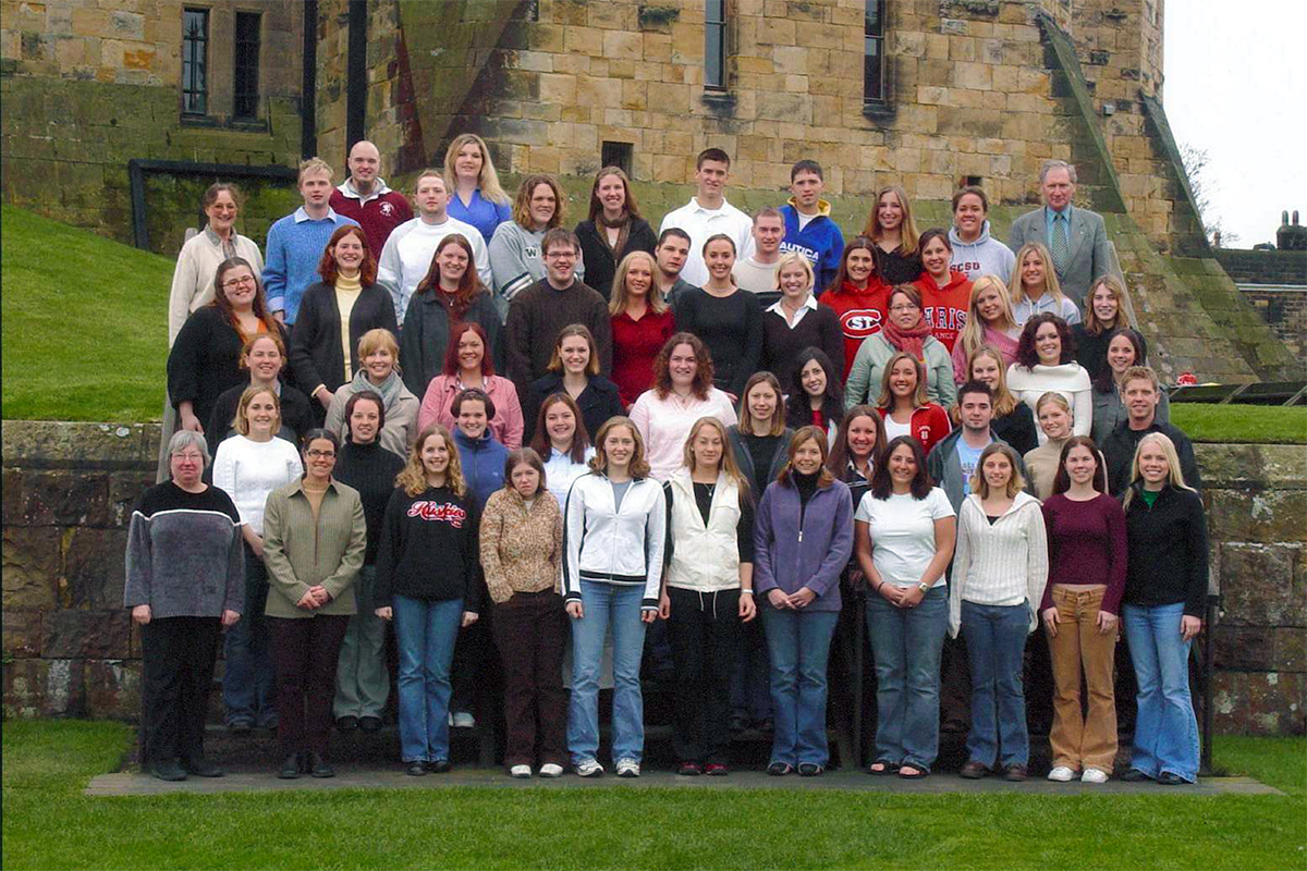 Class photo in front of castle