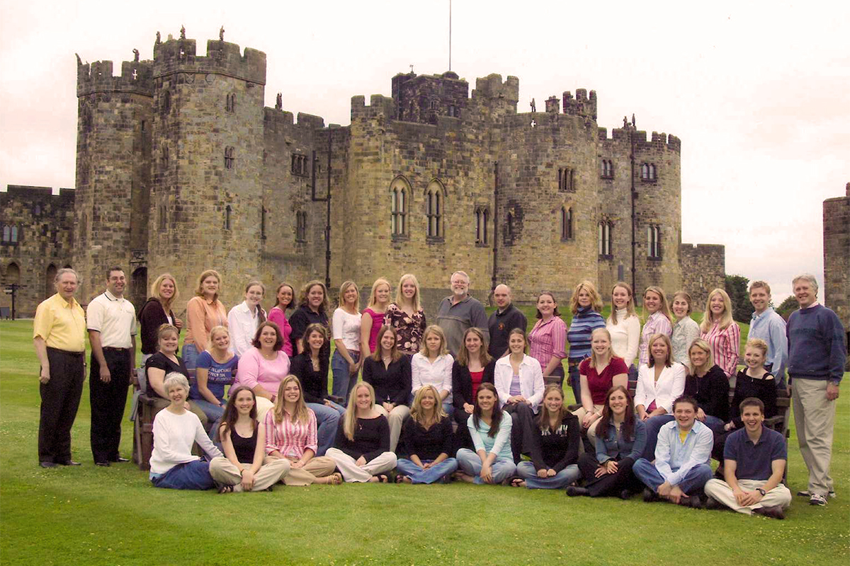 Class photo in front of castle