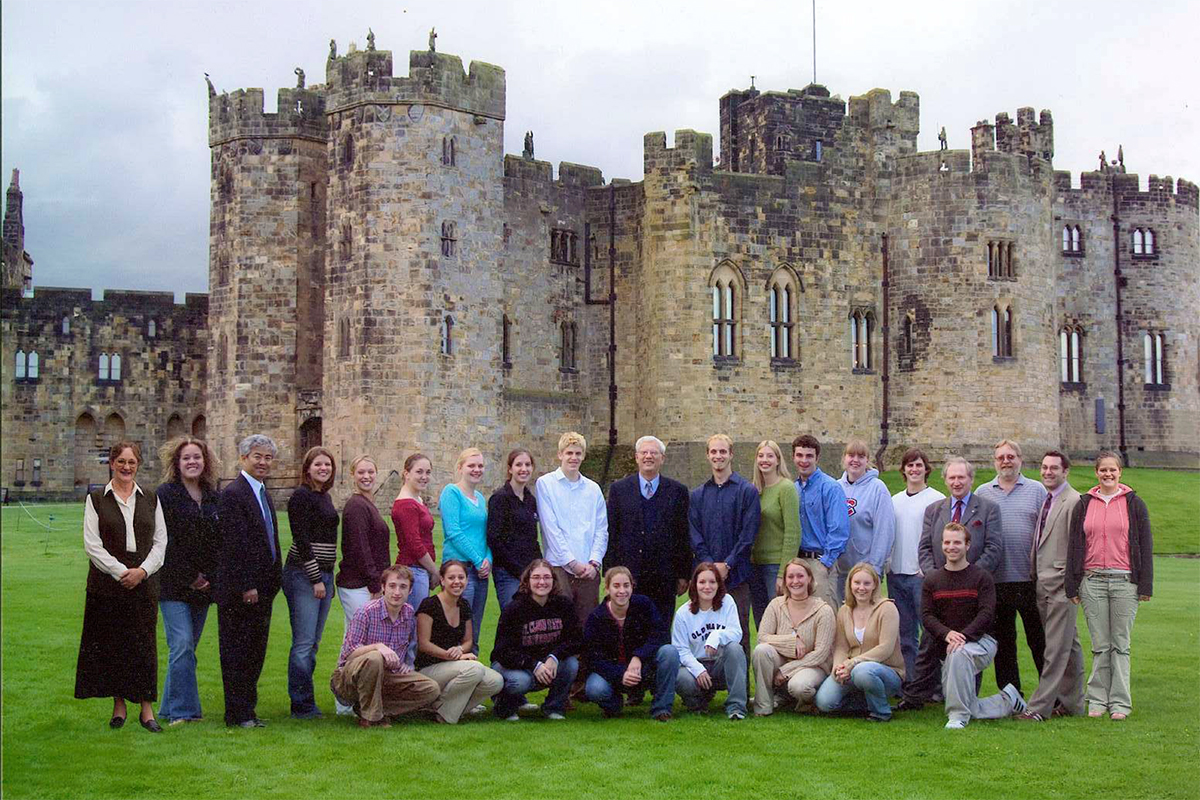 Class photo in front of castle