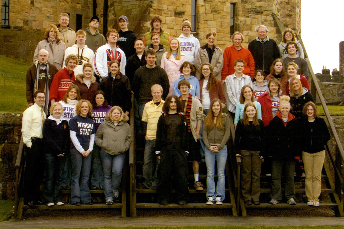 Class photo in front of castle