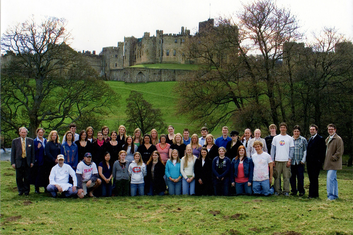 Class photo in front of castle