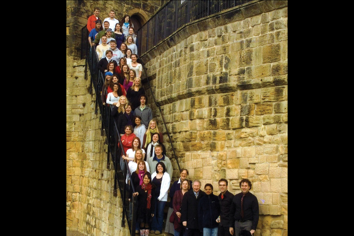 Class photo in front of castle