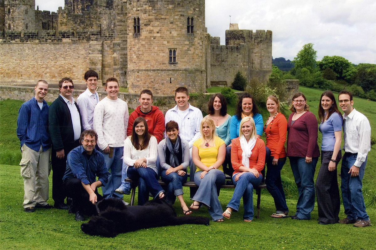 Class photo in front of castle