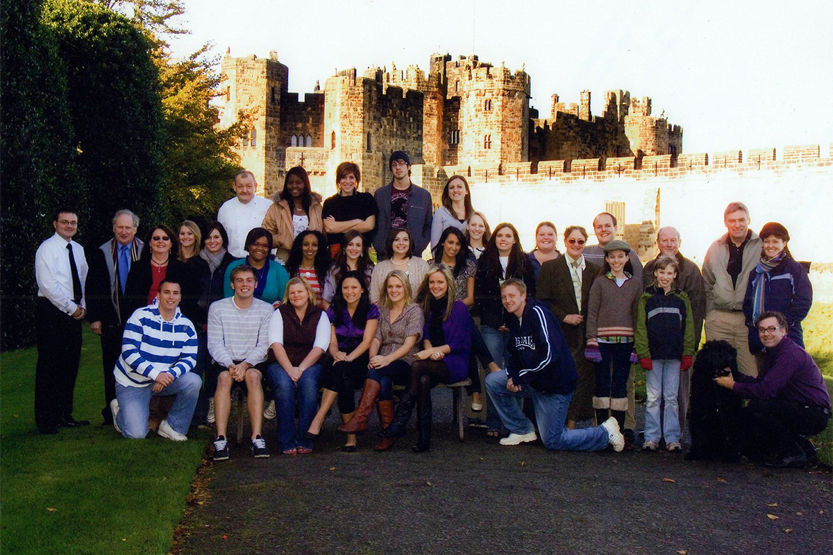 Class photo in front of castle