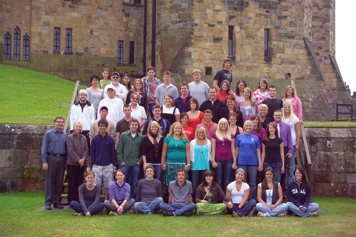 Class photo in front of castle