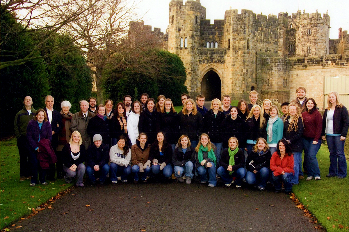 Class photo in front of castle