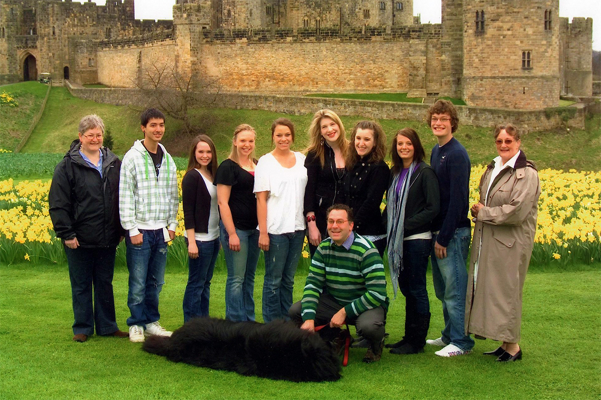 Class photo in front of castle