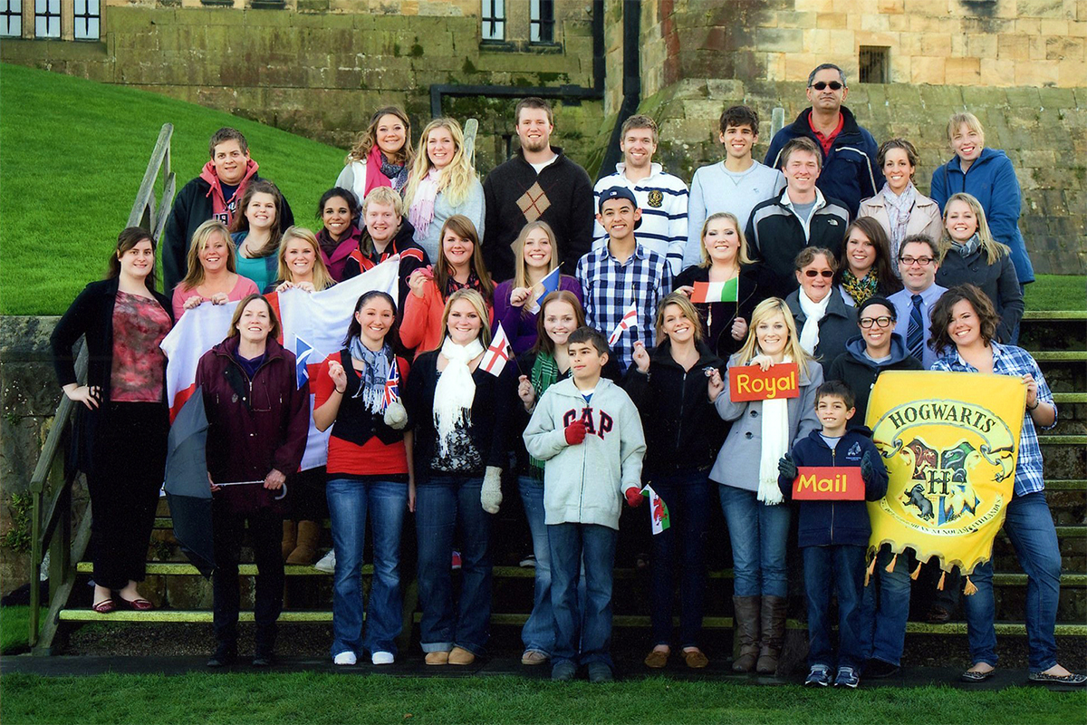 Class photo in front of castle
