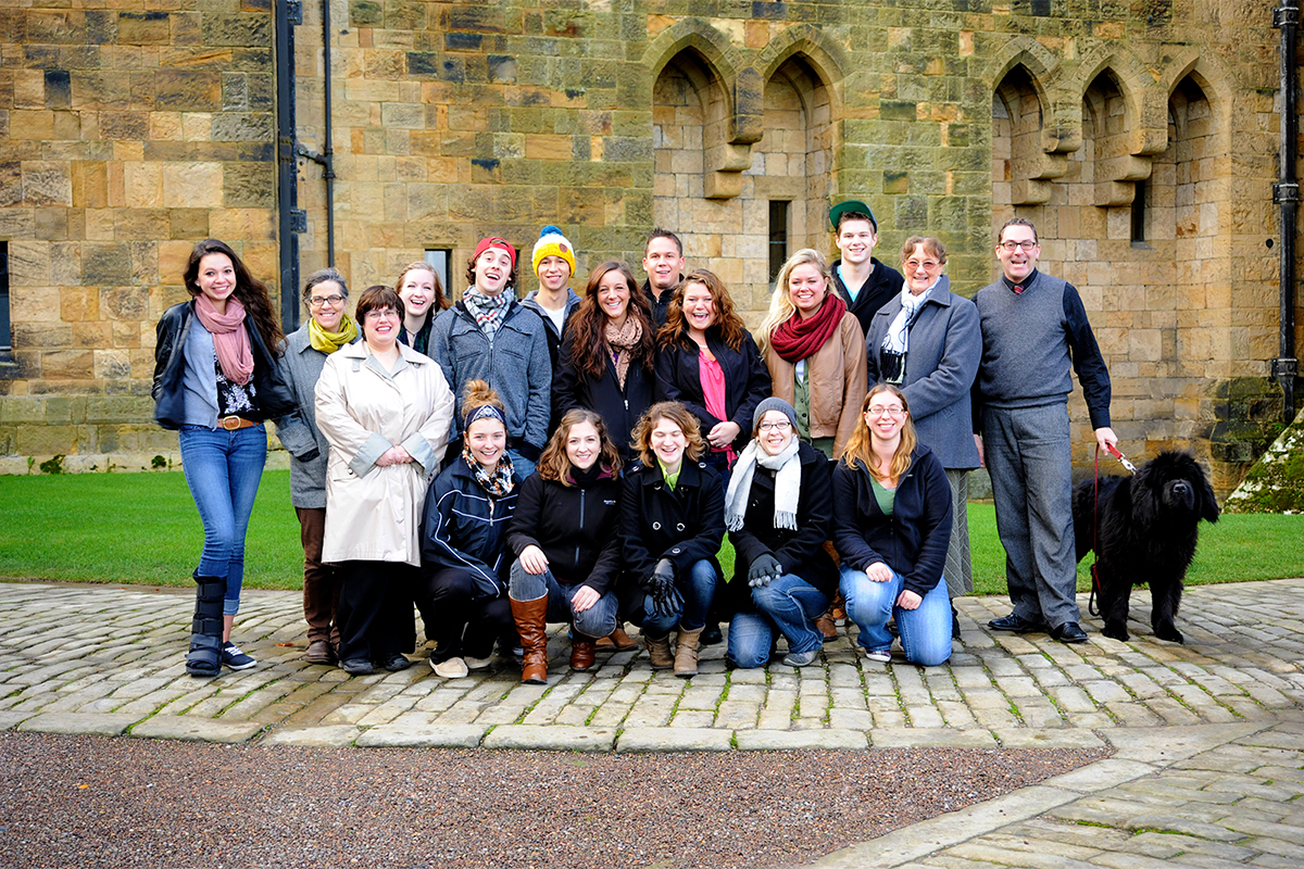 Class photo in front of castle