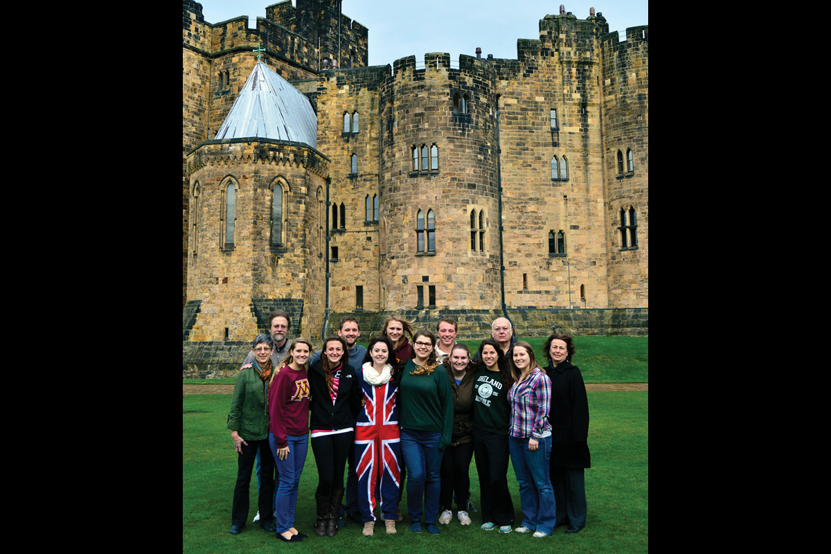 Class photo in front of castle