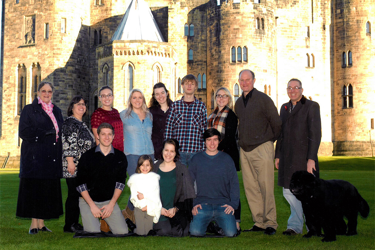 Class photo in front of castle