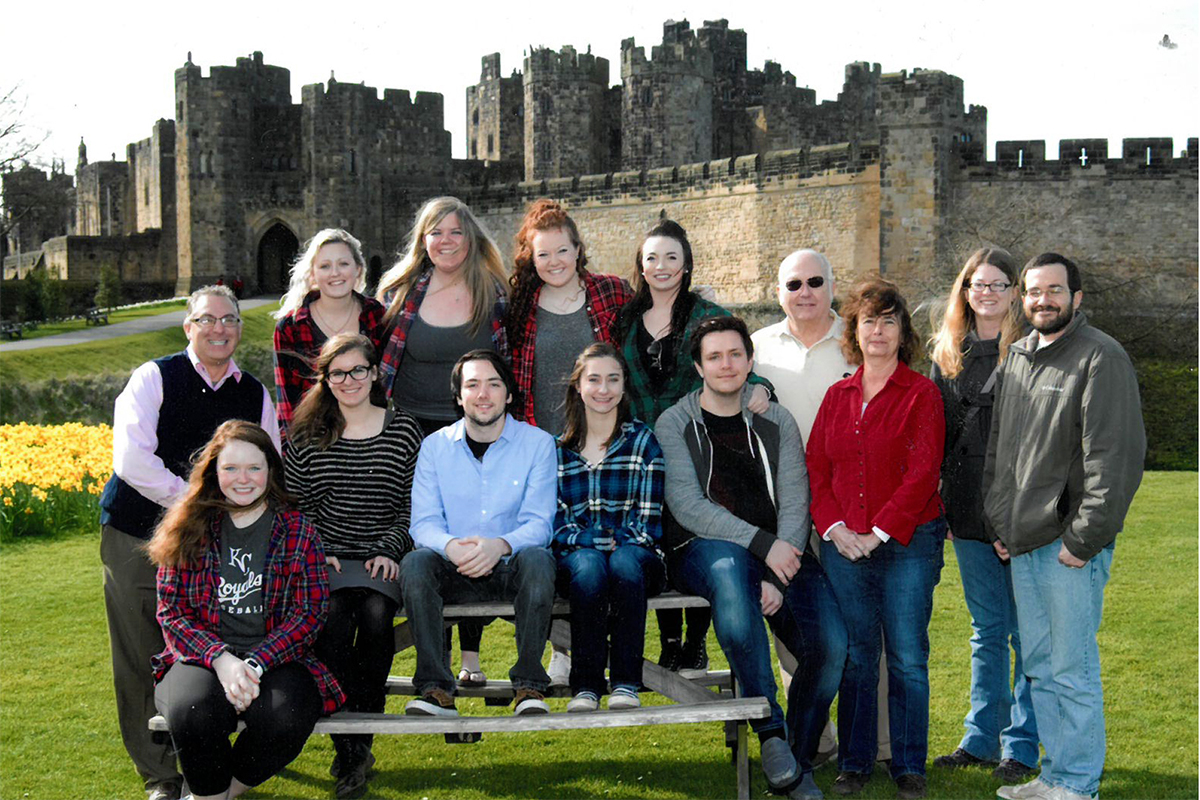 Class photo in front of castle