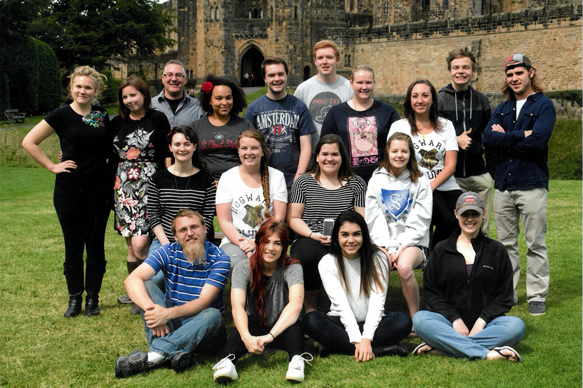 Class photo in front of castle