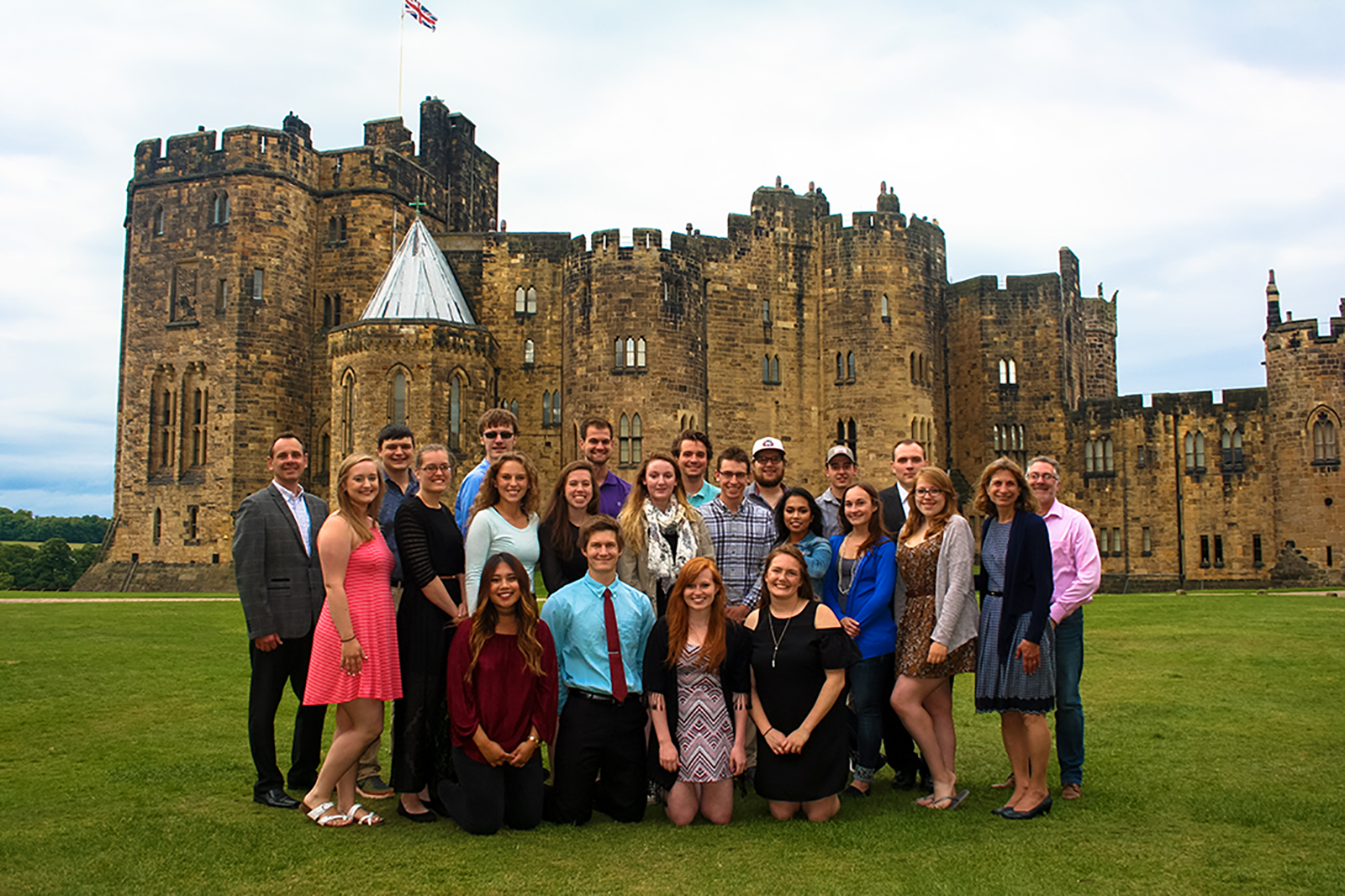 Class photo in front of castle